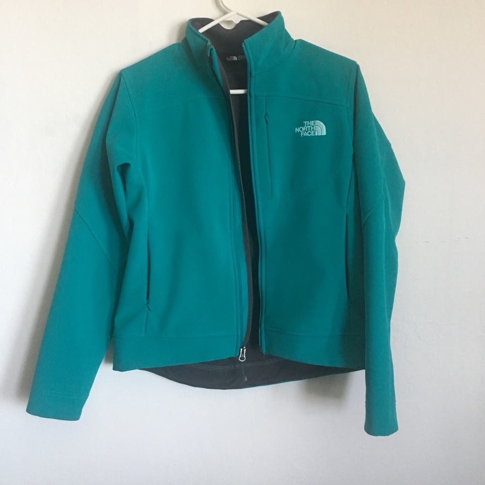 Turquoise North Face jacket in great shape!